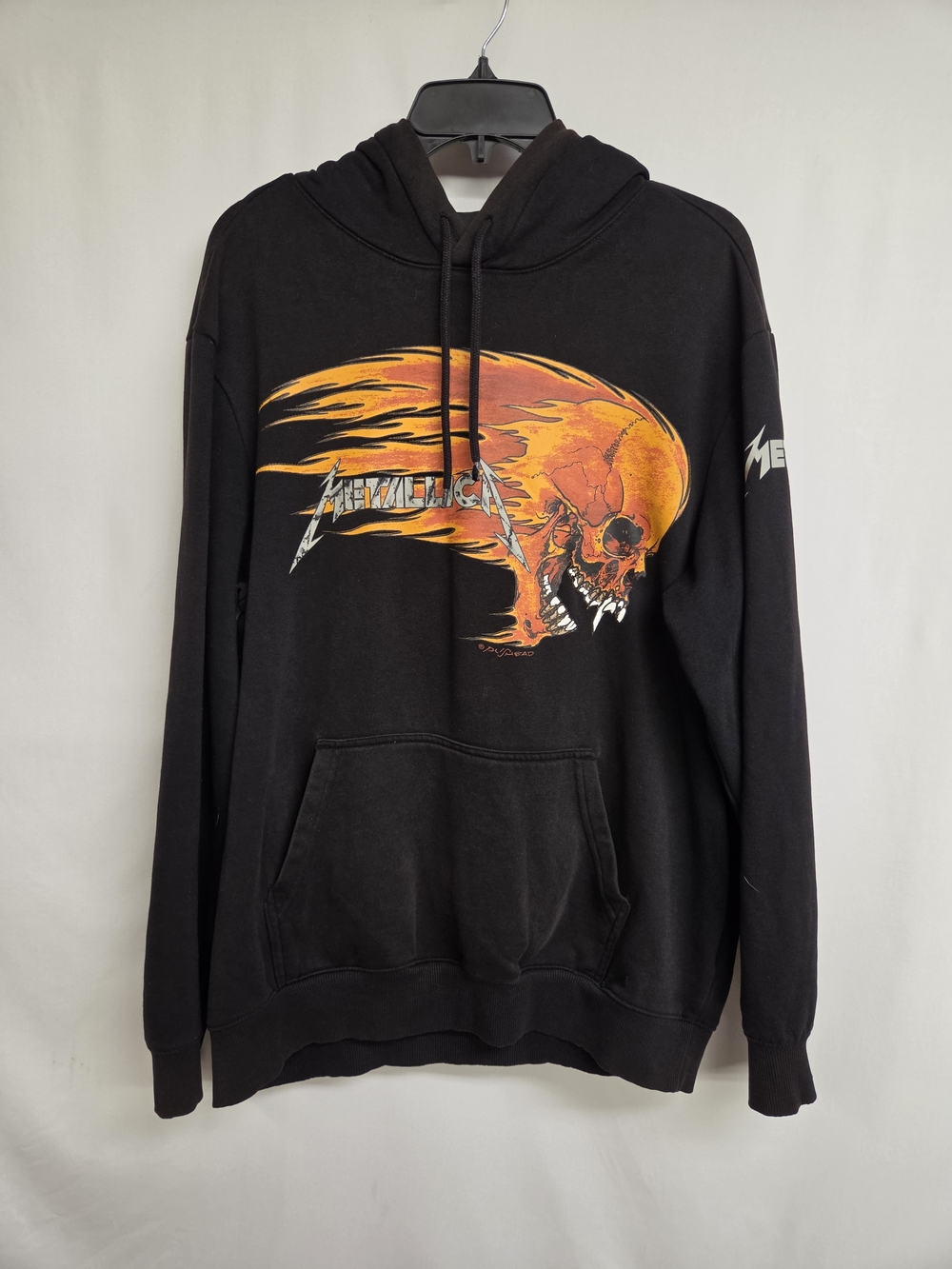 H&M Black Pullover Hoodie with Orange Flaming Skull Graphic
